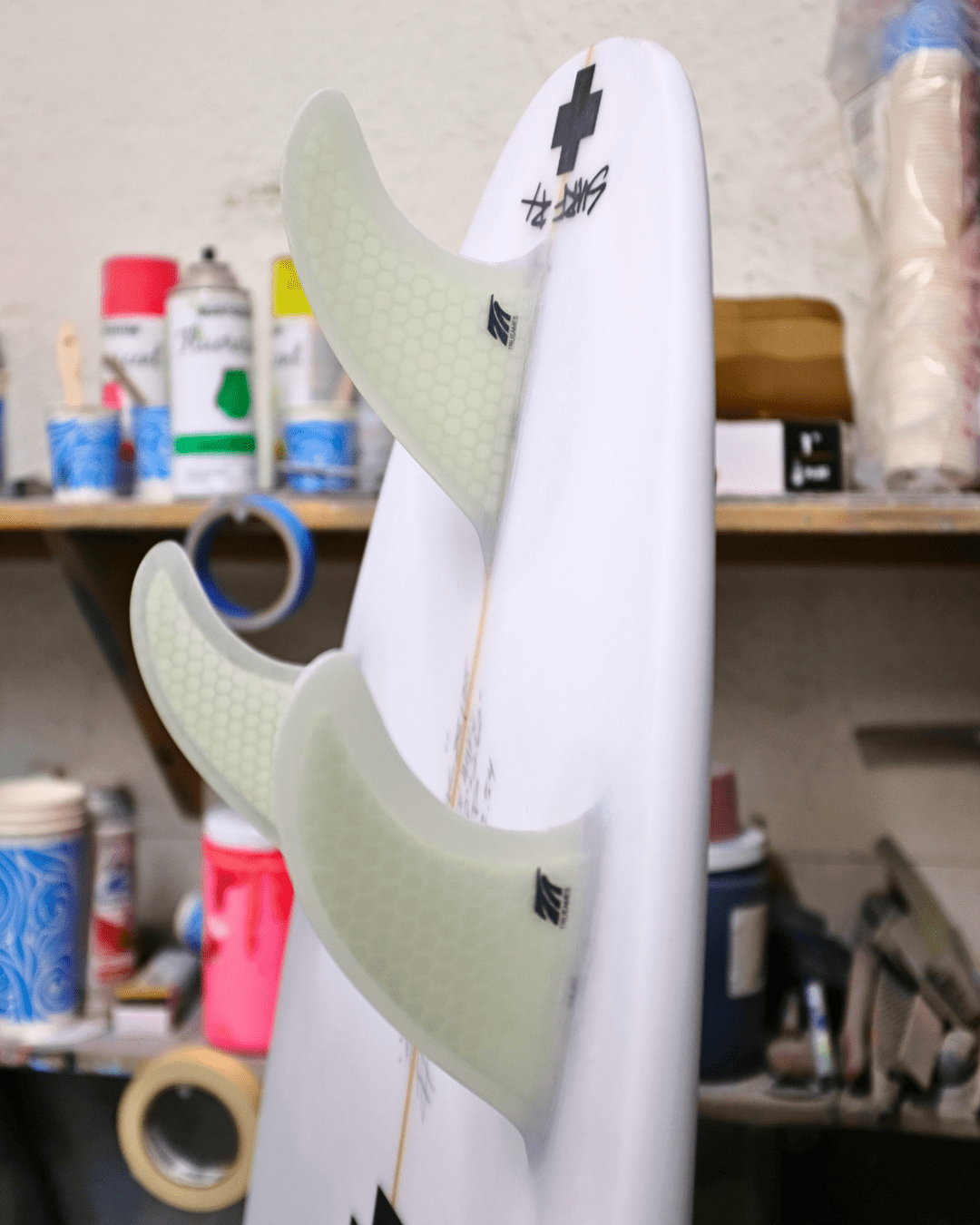 Custom rxp performance shortboard by surf prescriptions glassed on fins